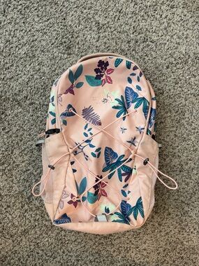 The North Face Pink Floral Backpack with Blue & Green Leaf Print
